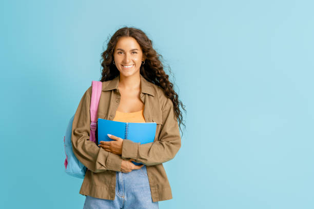 istock young woman on bright color background 1368699395