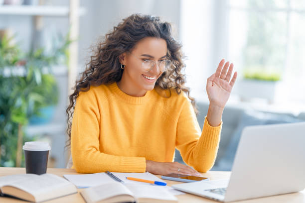 istock woman working on laptop at home. 1368699959