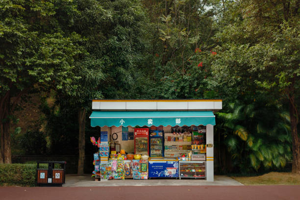 Small kiosk surrounded by greenery in a park in China stock photo