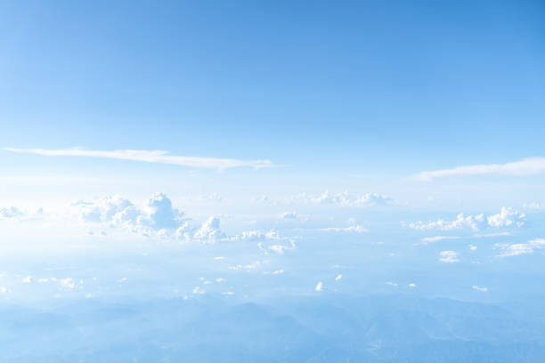 istock Blue sky and white clouds on a sunny day 1368703817