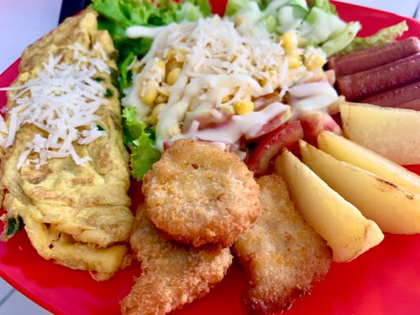 istock Vegetable salad with scrambled egg, nugget and potatoes 1368704891