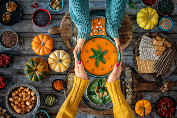 istock Two women drinking their vegetable soups. 1368730216