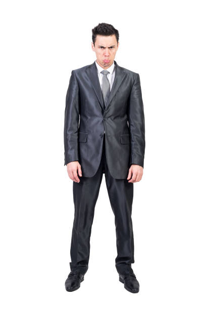istock Funny angry businessman in studio. White background. 1368730895