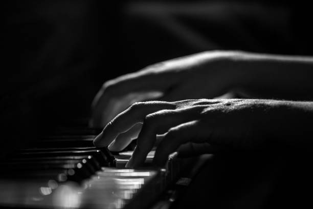 istock Pianist's hands in black and white 1368731576