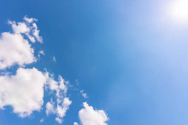 istock Clouds are white in the clear sky opposite the sun. 1368732133