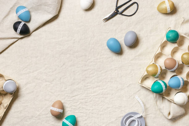 3d render of perfect easter eggs and lit blue background.