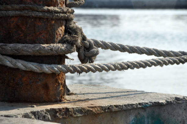 istock Mooring ropes for ships in the harbor 1368740541