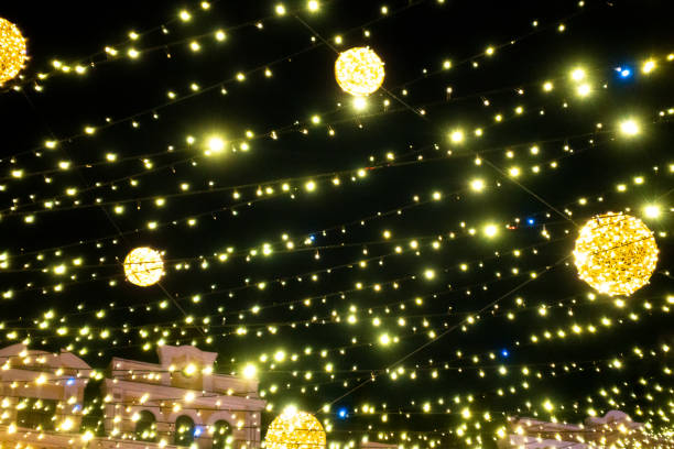 istock Glowing garland on the background of the night sky 1368748556