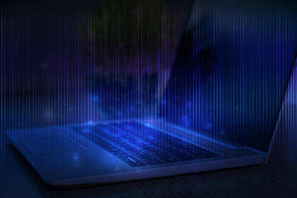 istock Laptop with stripes of light on blue. 1368751916