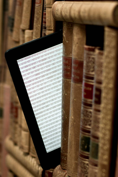 old books on the shelf with a tablet in between
