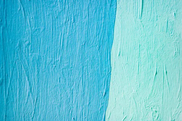 Photo of Blue paint texture on a canvas surface, as a background