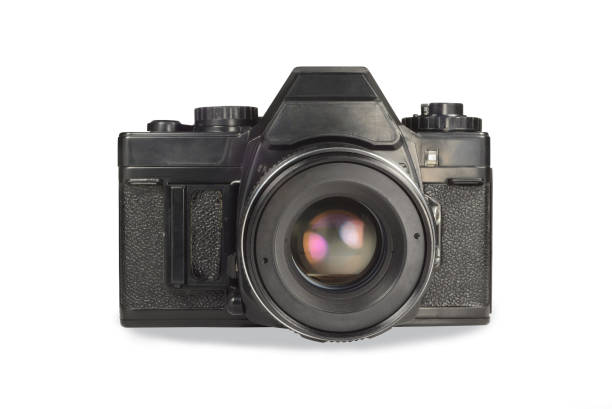 istock Old film camera isolated on white background. 1368757683