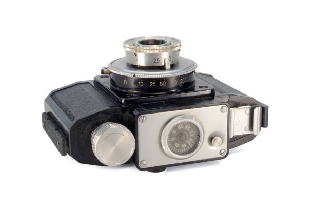 istock Old film camera isolated on white background. 1368757730