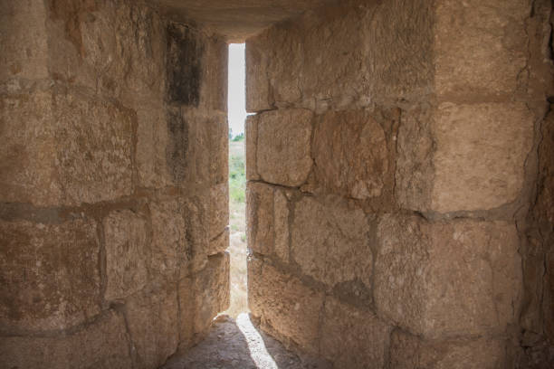 An historic Embrasure, loophole in an old wall of an Ottoman fortress, from the inside stock photo