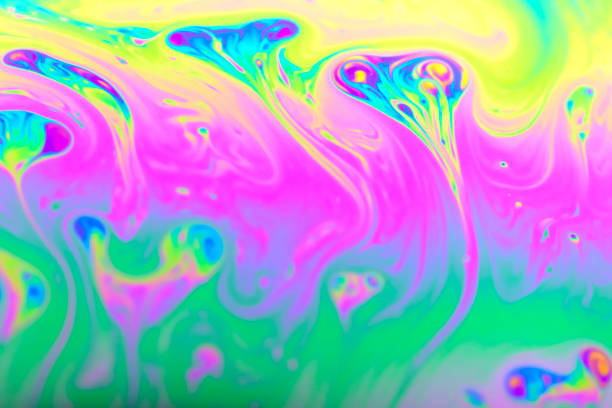 Defocused blurred abstract trendy neon colored psychedelic fluorescent striped background