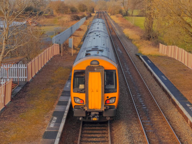 istock Generic Diesel powered railway line station in the English countryside. 1368771098