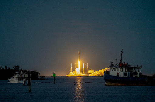 A SpaceX Falcon 9 rocket launches from Florida. The image shows the rocket clearing the lightning arrestor towers at dusk. Payload was a COSMO-SkyMed 2nd Generation satellite. The booster was previously flown as a side booster on a falcon Heavy launch, and was successfully returned for a landing at Cape Canaveral
Merritt Island, Florida
1/31/2022