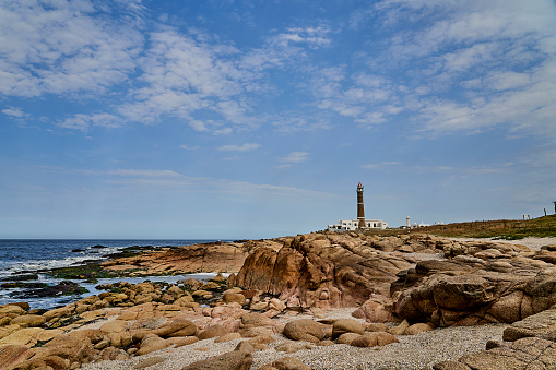 The lighthouse sits alongside the Pacific Ocean. Offering a guiding light to those who travel across the waters of the Pacific. For those on land, it offers a stunning scene. Built in 1896, this lighthouse is located in the Bullards Beach State Park.
