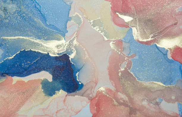 A fragment of alcohol ink painting (coral, blue and gold colors). Abstract colorful background, wallpaper. Mixing acrylic paints. Modern art. Marble texture. Alcohol ink colors translucent. Abstract contemporary art fluid. Contrast Ink pattern un fragmento de pintura de tinta alcohólica (colores coral, azul y dorado). fondo abstracto colorido, fondo de pantalla. mezcla de pinturas acrílicas. arte moderno. textura de mármol. tinta de alcohol colores translúcidos. fluido de arte contemporáneo