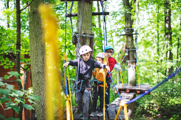 istock Children in zip line park 1368780210