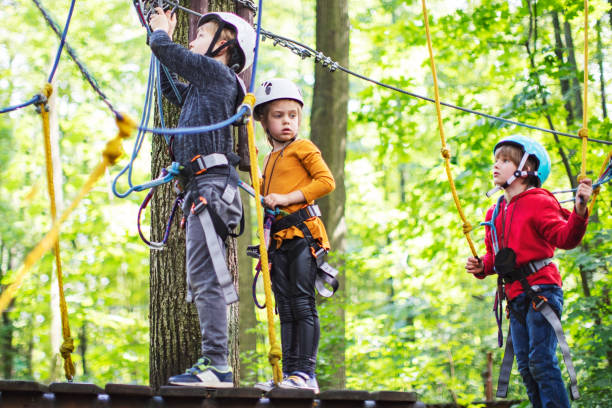 istock Children in zip line park 1368780284