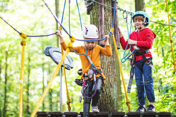 istock Children in zip line park 1368780326