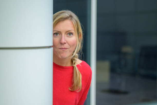istock Pretty middle-aged blond woman with happy look 1368780352