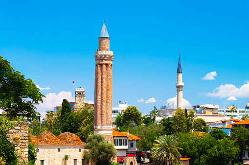 Panoramic view of Antalya Kaleici Old Town with the Clock Tower, Yivli Minaret and Tekeli Mehmet Pasa mosque. Antalya, Turkey. High quality photo