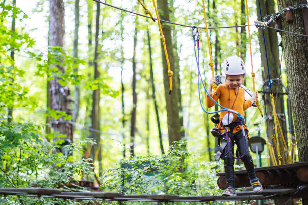 Little girl in zip line park