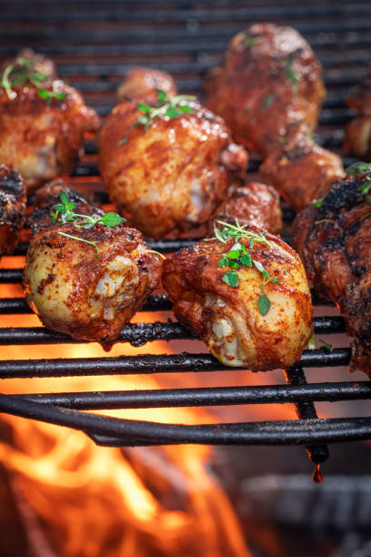 istock Hot roasted chicken leg marinated with honey and spices. 1368780679
