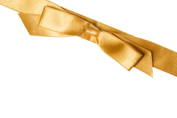 istock Close up gold ribbon with bow isolated on white background 1368782416