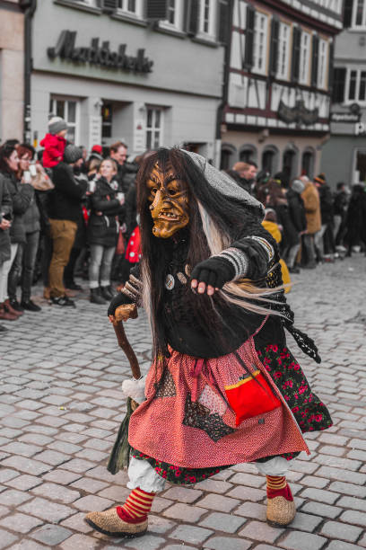 Oberkirch, Germany - February 12, 2023: Traditional carnival parade with traditionell masks and costumes