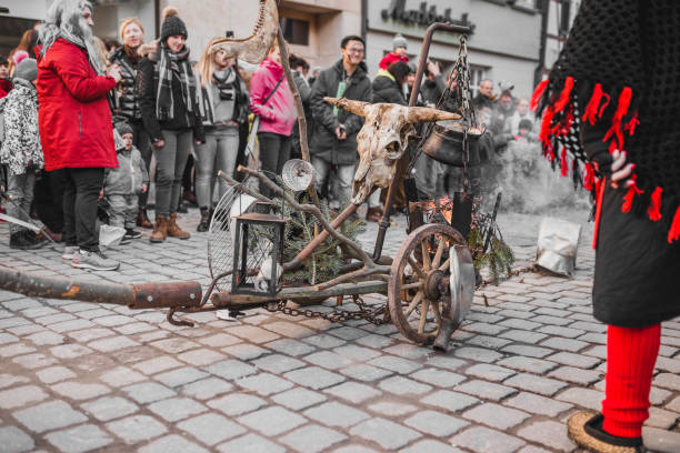 Swabian Fasnet - Colorful carnival Tuebingen, Germany - February 09, 2020: Swabian Fasnet - Colorful carnival procession on the street of the old town of Tübingen - Swabian-Alemannic Fasnet is a pagan affair with old traditions fasnacht festival stock pictures, royalty-free photos & images