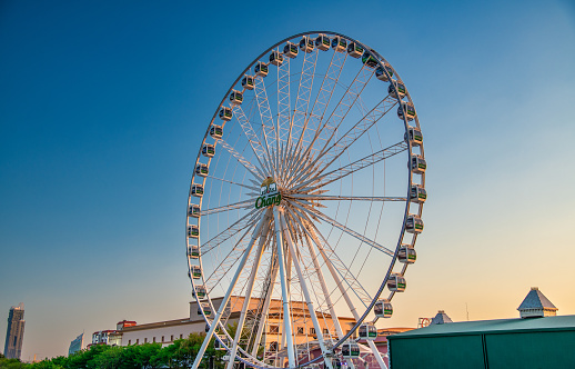 Bangkok, Thailand - January 5, 2020: Ferris Wheel in Asiatique Waterfront at sunset