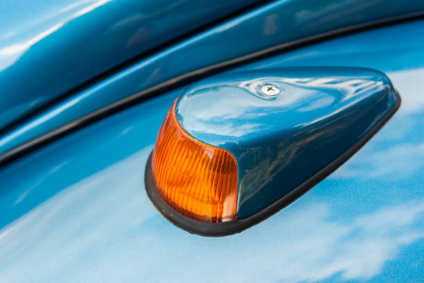 istock Flashing light of a blue German vintage car 1368794981