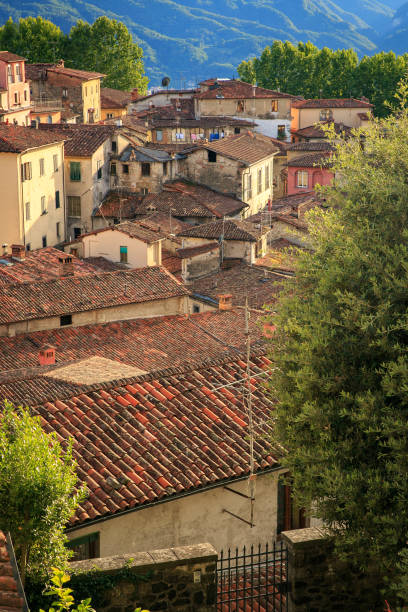 istock Barga Italian mountain town cityscape skyline rooftops 1368797471