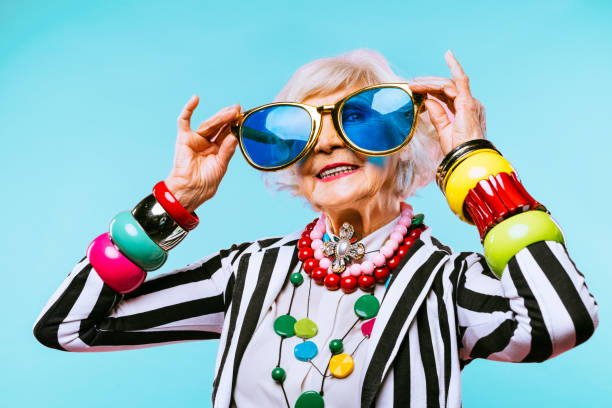 Cool and stylish senior old woman with fashionable clothes stock photo
