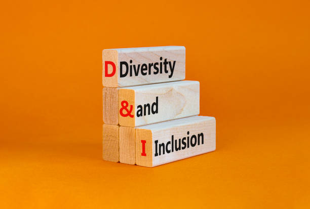 istock D and I, Diversity and inclusion symbol. Concept words D and I, diversity and inclusion on blocks on beautiful orange table orange background. Business, D and I, diversity and inclusion concept. 1368802414