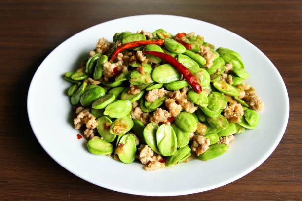 Stir fried bitter beans with minced pork. photo stock photo