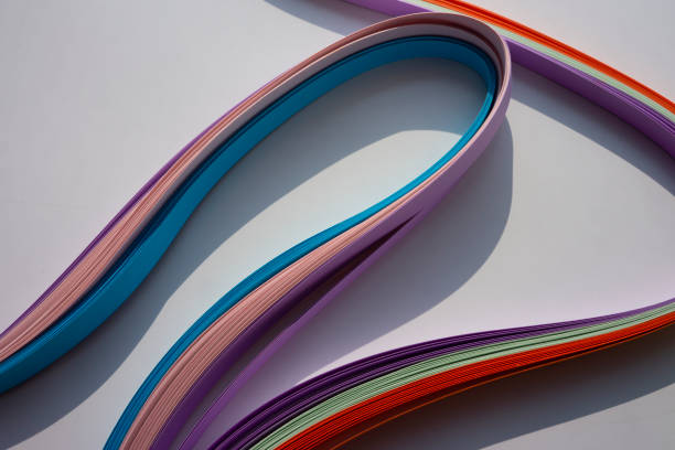 istock Geometric pattern of curved paper background. 1368804960