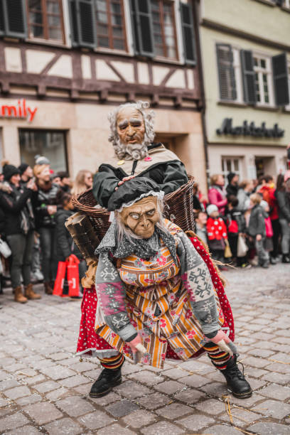 Swabian Fasnet - Colorful carnival Tuebingen, Germany - February 09, 2020: Swabian Fasnet - Colorful carnival procession on the street of the old town of Tübingen - Swabian-Alemannic Fasnet is a pagan affair with old traditions fasnacht festival stock pictures, royalty-free photos & images