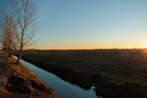 istock sundown in the countryside at winter going down over the land 1368810664
