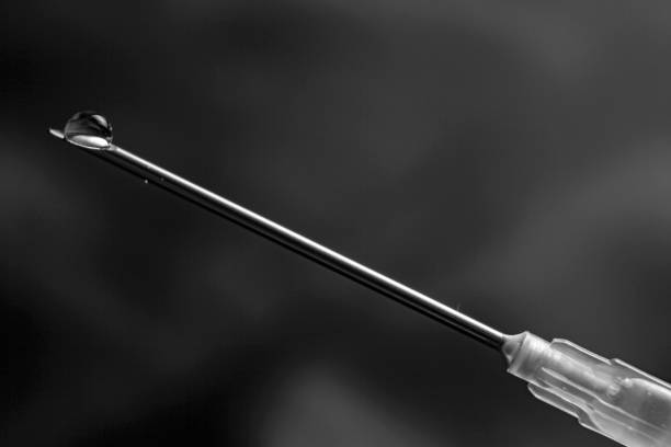 istock Syringe and drop on the top 1368810813