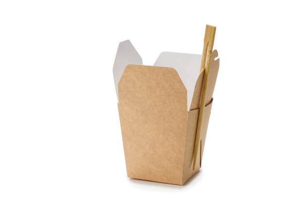 istock Paper container for Asian food with chopsticks. 1368814631