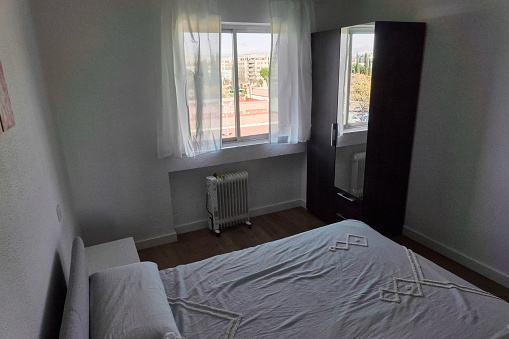 the bedroom with its wardrobe, bed... of a house in Spain