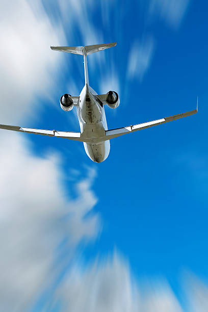 istock corporate jet airplane flying in motion blur sky 136881538