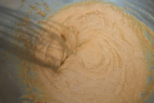 Mixing peanut butter in a large bowl