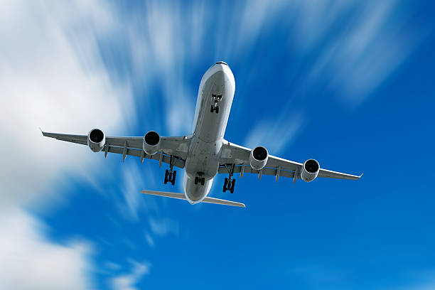 istock XL jet airlane landing in motion blur sky 136881641