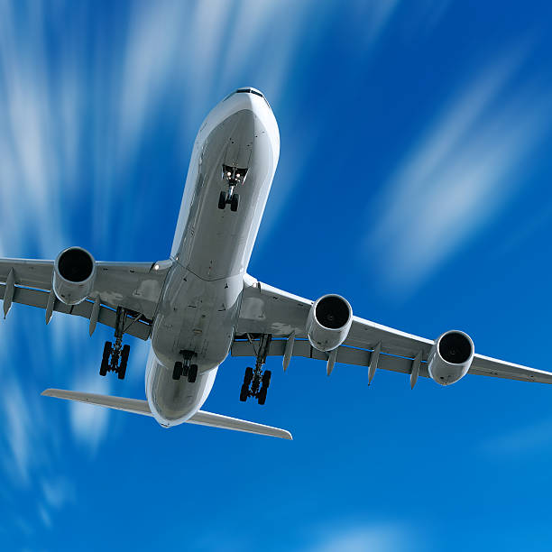 istock jet airplane landing in motion blur sky 136881707