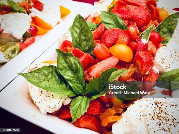 Burrata Cheese Strawberry And Heirloom Tomato Salad Stock Photo - Download Image Now